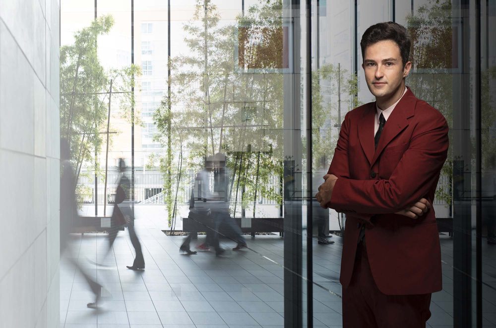 Business person walking in a urban building
